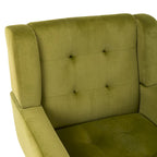 Poltroncina di design in velluto verde con gambe in legno nero, a sedile singolo