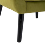 Poltroncina di design in velluto verde con gambe in legno nero, a sedile singolo