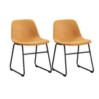 Sedia da Pranzo Senza Braccioli in Similpelle Color Cuoio, Gambe in Metallo Nero, Set da 2