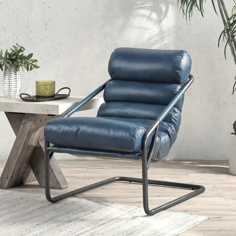 Poltrona singola, in pelle marrone/blu, con schienale a canale