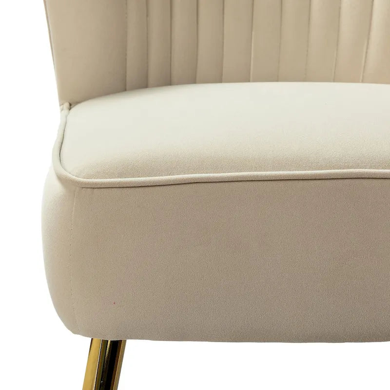 Poltroncina senza braccioli in velluto viola, schienale capitonné, gambe dorate, singolo
